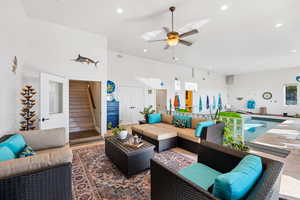 Living area with ceiling fan and recessed lighting
