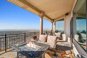 Balcony featuring a fire pit