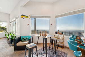Sunroom featuring baseboards