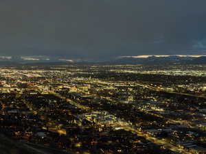 View of city lights with a mountain view