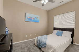 Bedroom with carpet floors and ceiling fan