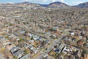 Aerial perspective of suburban area with a mountain backdrop