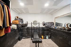 Walk in closet featuring carpet