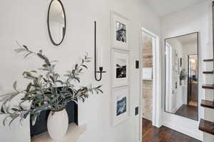 Hall with wood finished floors