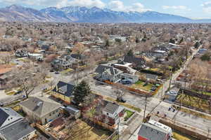 Aerial perspective of suburban area with a mountain backdrop