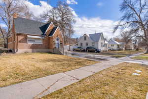 View of grassy yard featuring a residential view