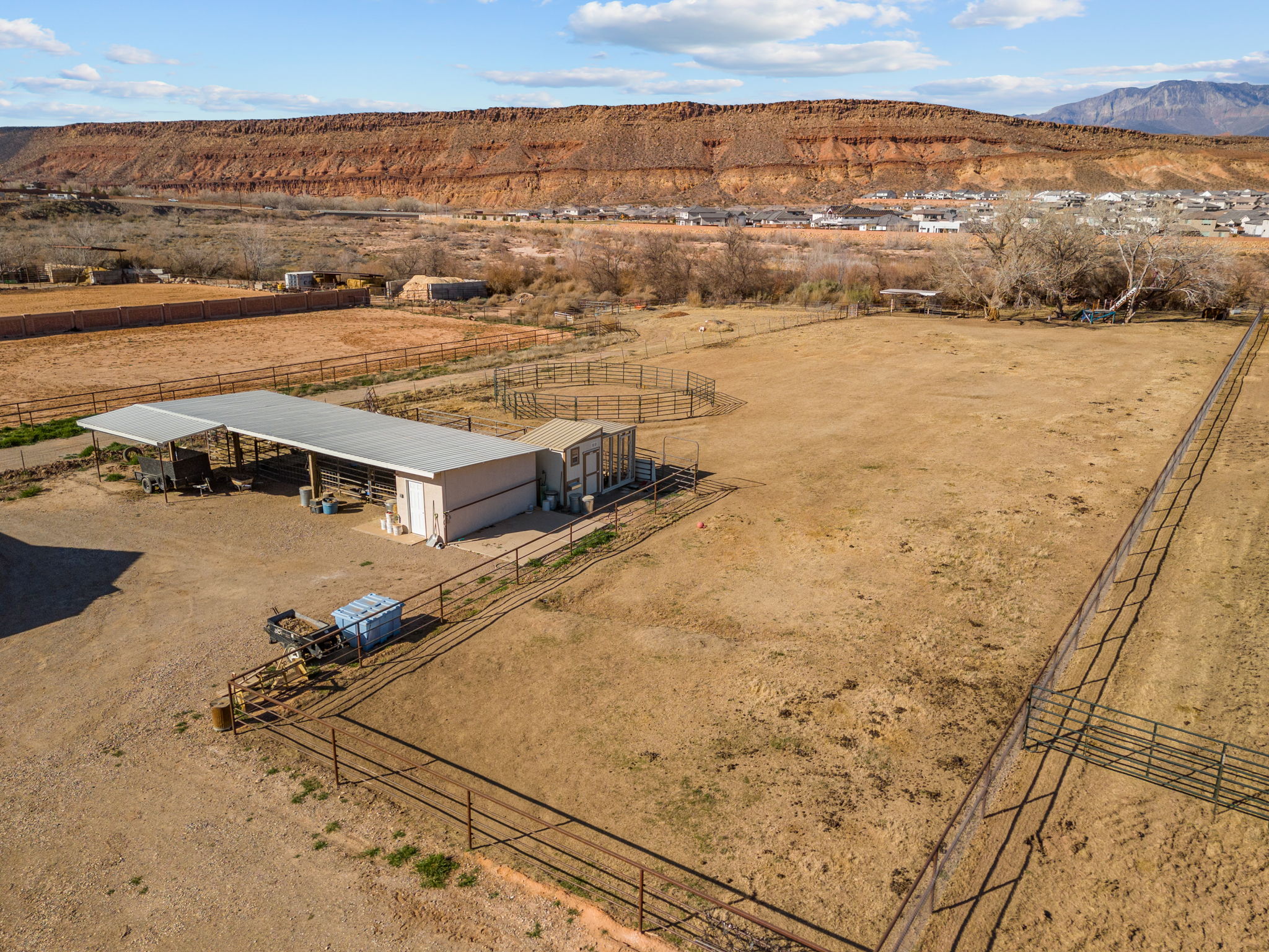 View of back 1 ACRE Pastor with flood irrigation shares and a mountainous background