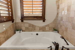 Bathroom with a garden tub