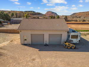 Detached garage with a mountain view