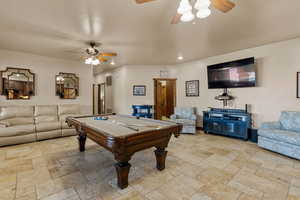 Game room featuring a ceiling fan, recessed lighting, pool table, and stone tile flooring