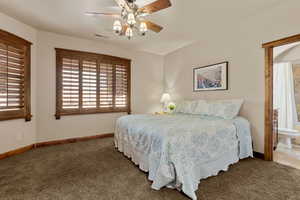 bedroom #3 with ceiling fan and ensuite bathroom