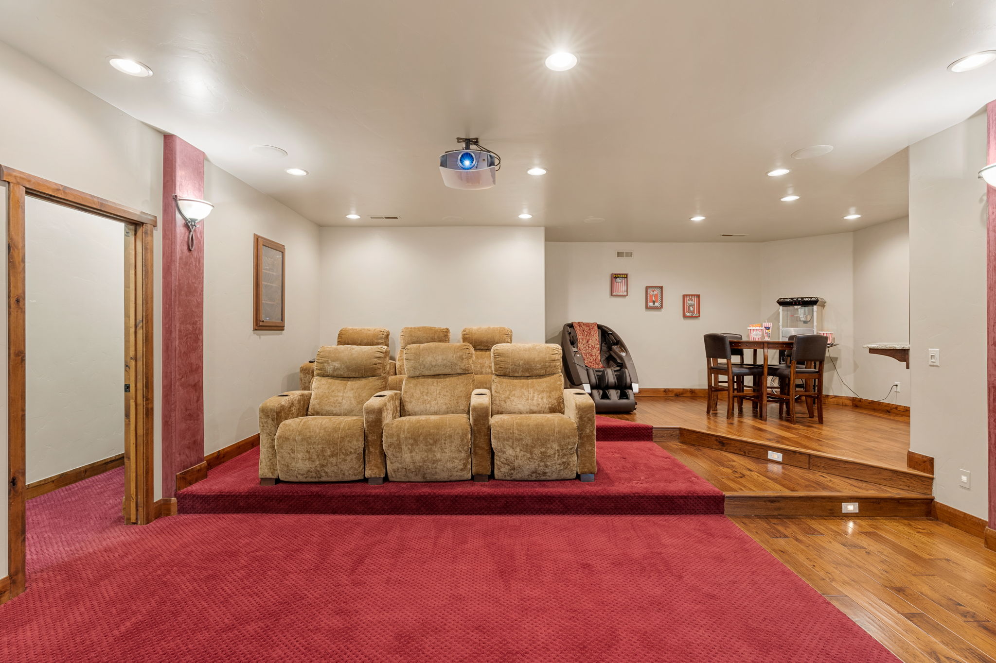 Home theater featuring recessed lighting and hardwood / wood-style floors