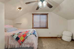 ADU bedroom #1  featuring baseboards and a ceiling fan