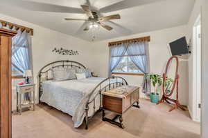 Bedroom with carpet floors and ceiling fan