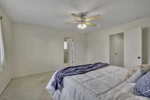 Bedroom featuring carpet floors and ceiling fan