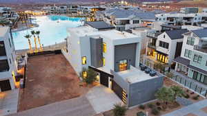 Aerial perspective of suburban area with a pool area