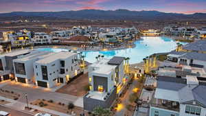 Aerial view of residential area featuring mountains