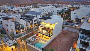 Aerial view of a pool area and mountains