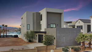 Modern home featuring stucco siding