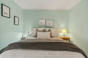 Bedroom with crown molding