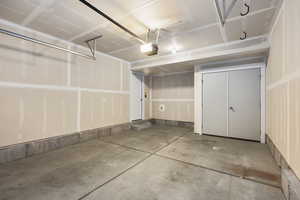 Garage featuring a garage door opener