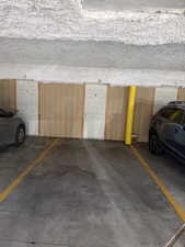Garage featuring a parking deck