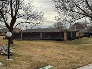 View of front of home featuring brick siding