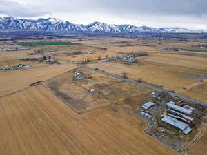 Aerial view of property's location featuring rural landscape and mountains