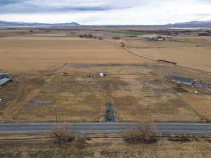 Overview of rural landscape with a mountain backdrop