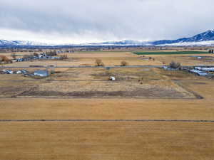Overview of rural landscape with a mountain backdrop