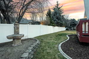 View of fenced backyard