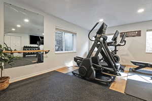 Workout room with recessed lighting