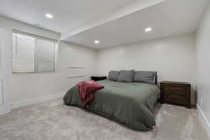 Bedroom with carpet flooring and recessed lighting