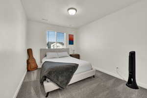 Additional secondary bedroom offering comfortable space and easy access to the full upstairs bathroom.