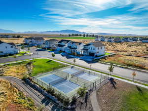 Community pickleball courts and surrounding open space add to the vibrant amenities offered within Bayview at Shoreline.