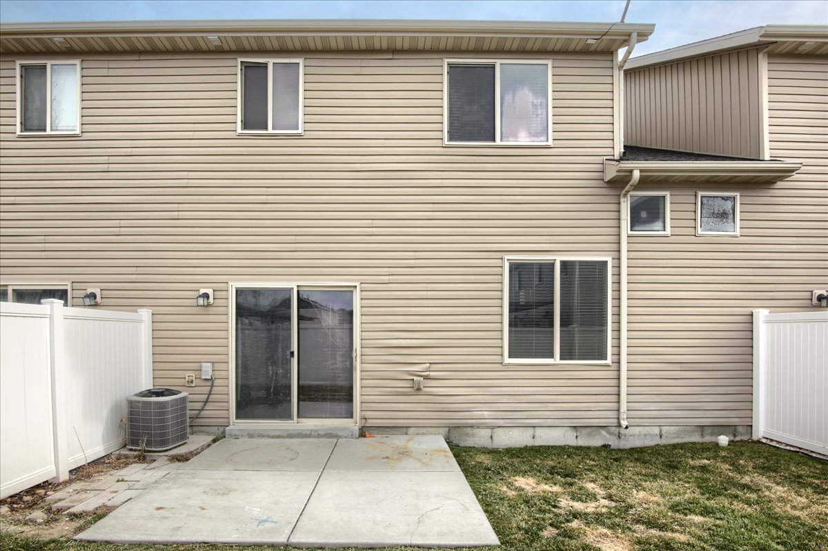 Rear view of house with a patio area