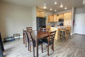 Dining room with light wood finished floors