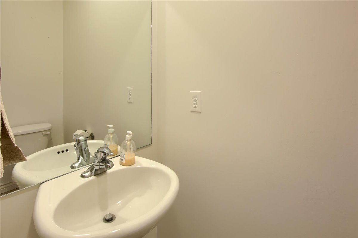 Bathroom featuring a sink and toilet