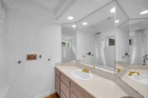 Full bath featuring vanity, a shower with curtain, and recessed lighting