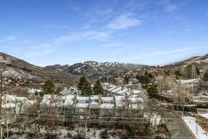 View of mountain backdrop with nearby suburban area