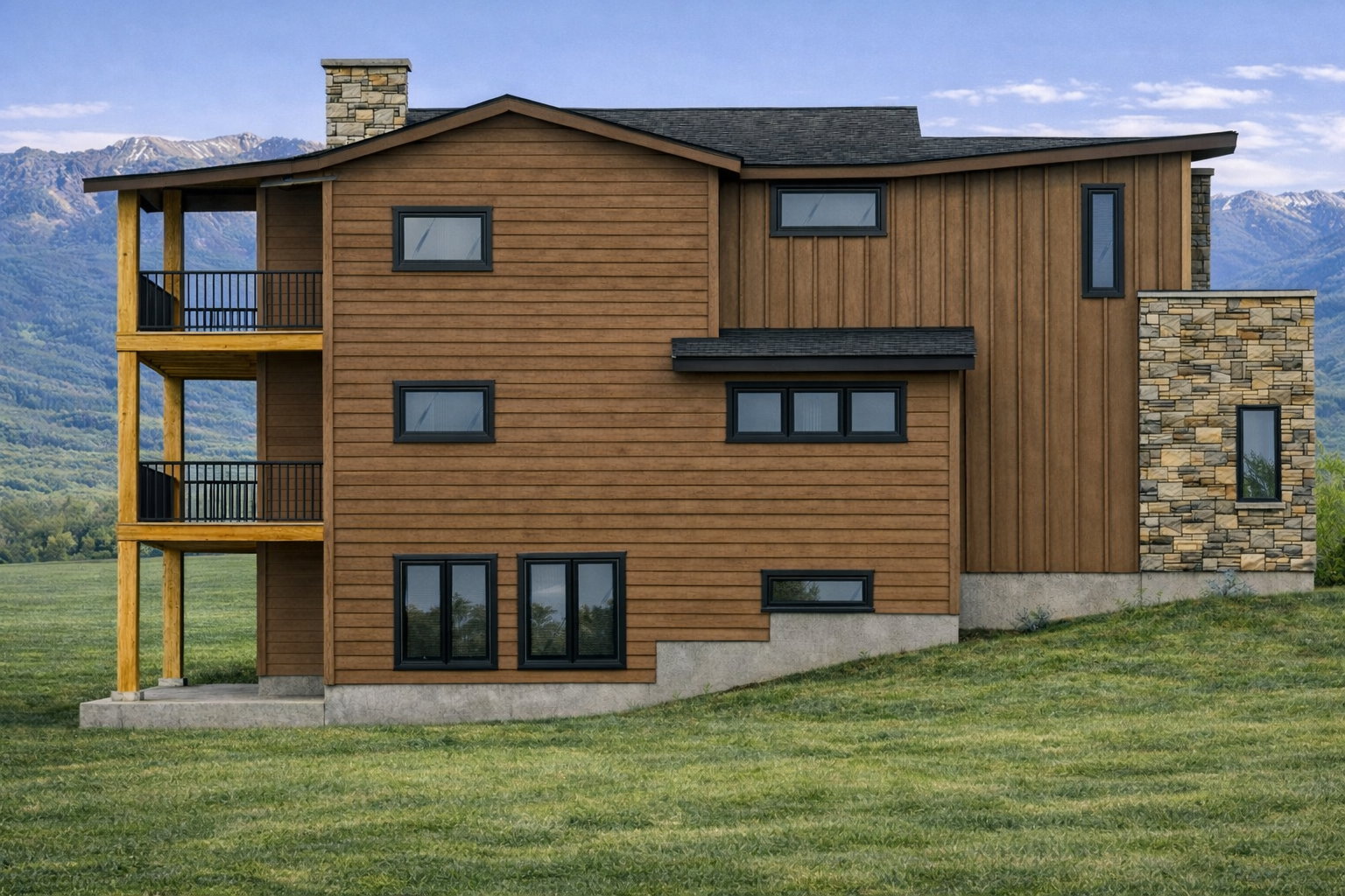 Back of house featuring a mountain view, a balcony, a lawn, and board and batten siding