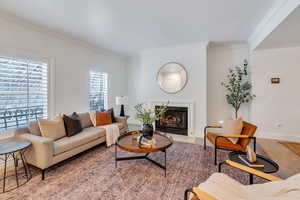 Cozy living room has plenty of seating