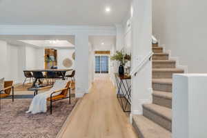 Interior space featuring light wood-style flooring and recessed lighting