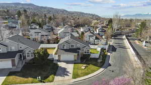 Aerial view of residential area with a mountainous background