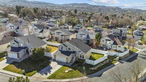 Aerial view of residential area with a mountainous background