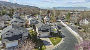 Aerial view of residential area with a mountain backdrop
