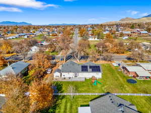 Aerial view of residential area featuring a mountain backdrop