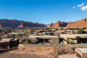 View of mountain backdrop with nearby suburban area