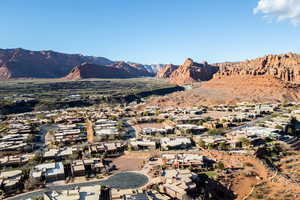Aerial perspective of suburban area featuring a mountain backdrop