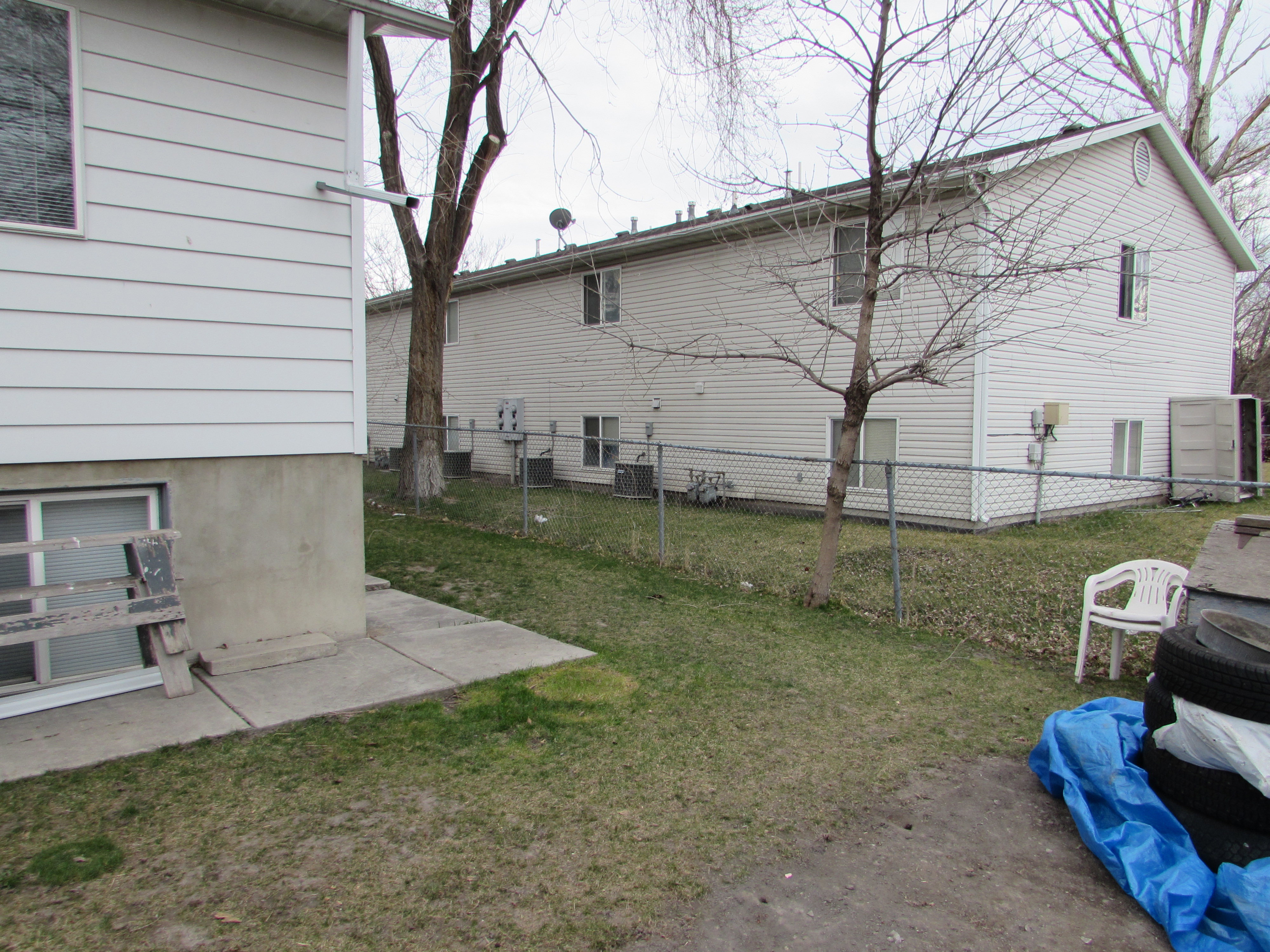 View of side of property with a patio area